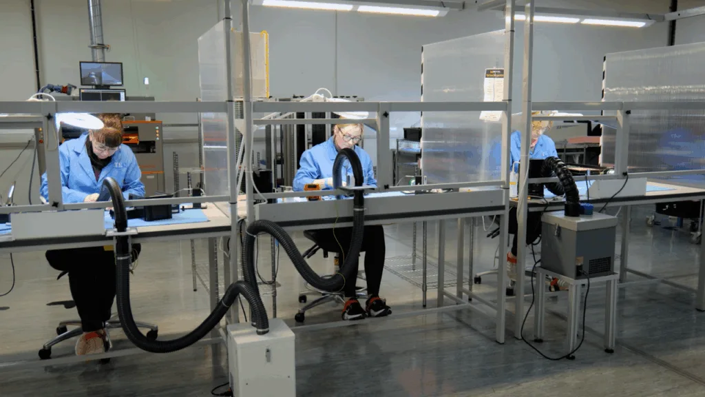 J-TEQ production operators working at assembly benches